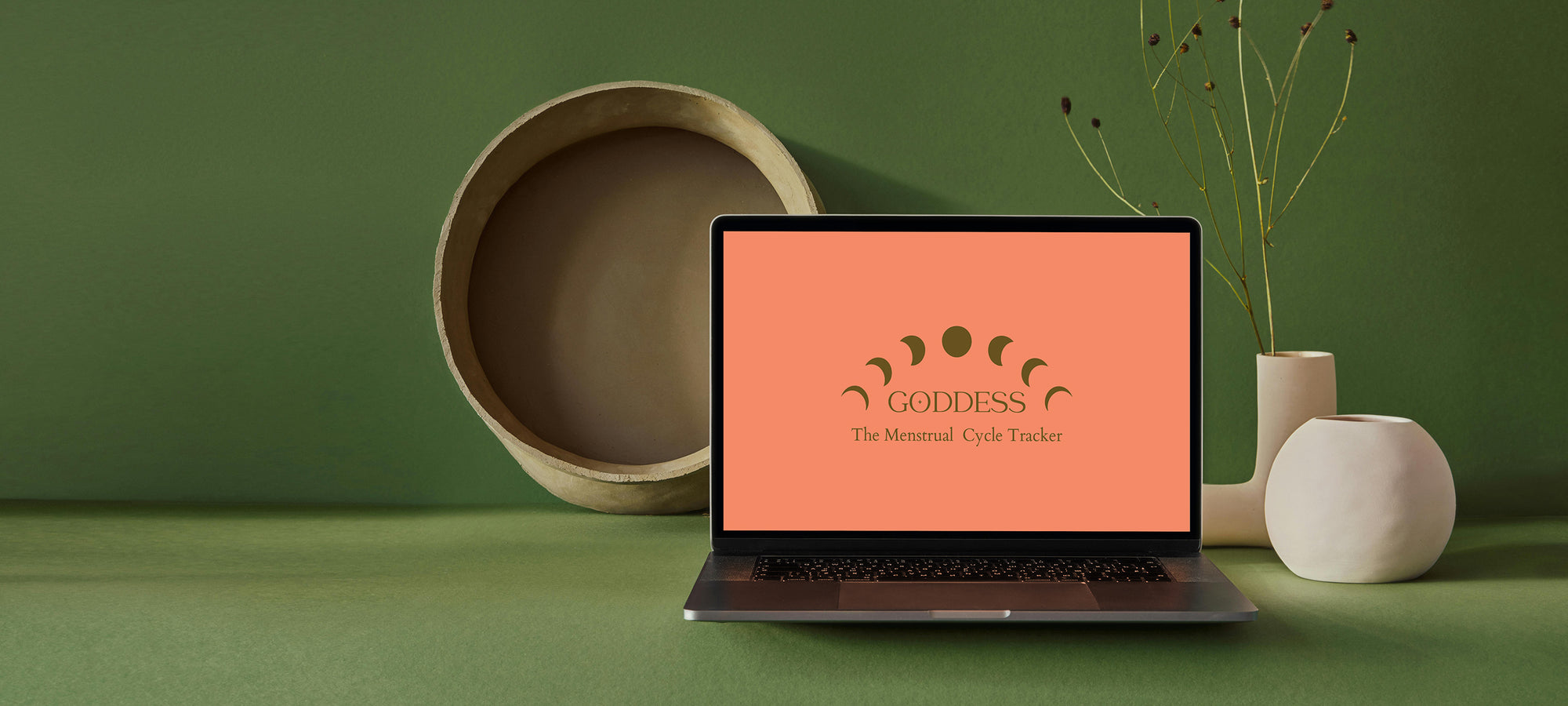 Goddess Menstrual Cycle Tracker on pc screen on green aesthetic background